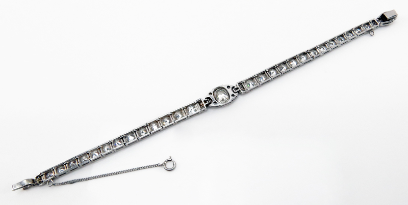 Art Deco Approx. 8.25 Carat Old European Cut Diamond and Platinum Bracelet Set in the Center with an approx. 1.0 Carat Oval Cut Diamond.