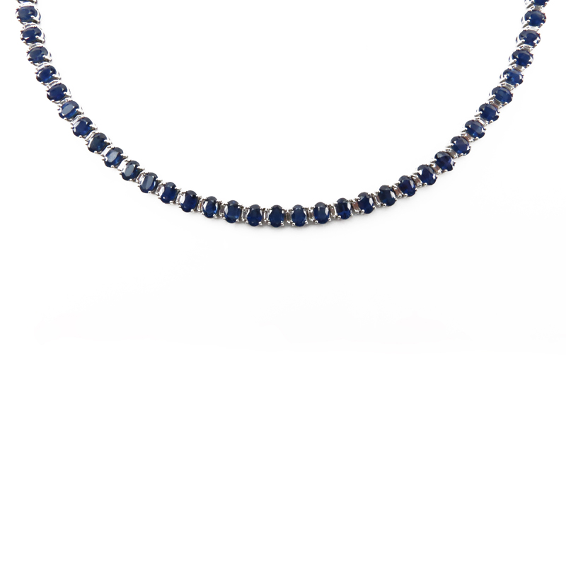 Approx. 50.0 Carat Oval Cut Sapphire, 3.0 Carat Baguette Cut Diamond and 18 Karat White Gold Necklace