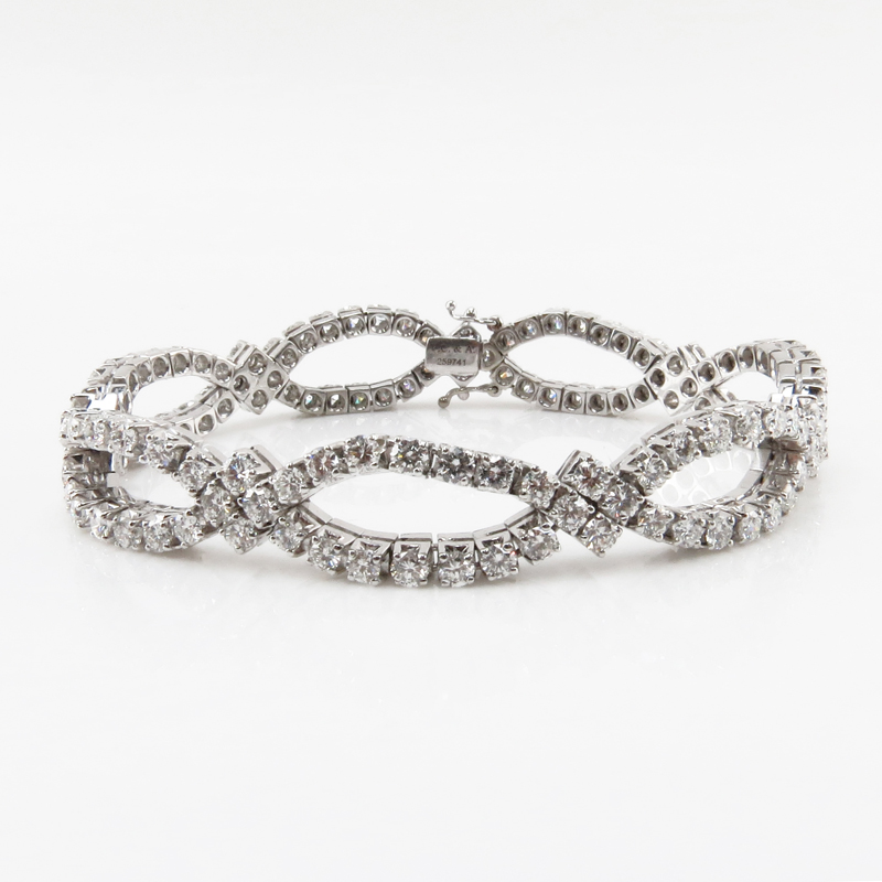 Van Cleef & Arpels Approx. 12.0 Carat Round Brilliant Cut Diamond and 18 Karat White Gold Bracelet. Diamonds D-E color, VVS-VS clarity. 