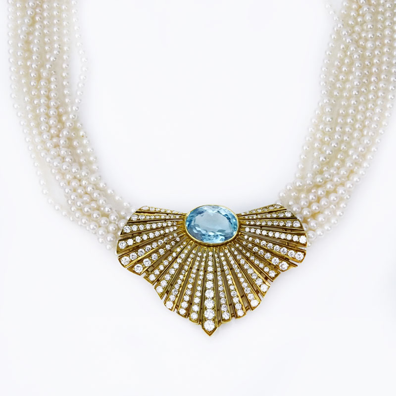 Retro Approx. 20.0-25.0 Carat Oval Cut Aquamarine, 12.0 Carat Round Brilliant Cut Diamond, 18 Karat Yellow Gold and Nine (9) Strand 4mm Pearl Pendant Necklace.