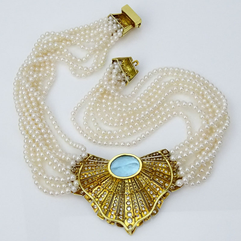 Retro Approx. 20.0-25.0 Carat Oval Cut Aquamarine, 12.0 Carat Round Brilliant Cut Diamond, 18 Karat Yellow Gold and Nine (9) Strand 4mm Pearl Pendant Necklace.