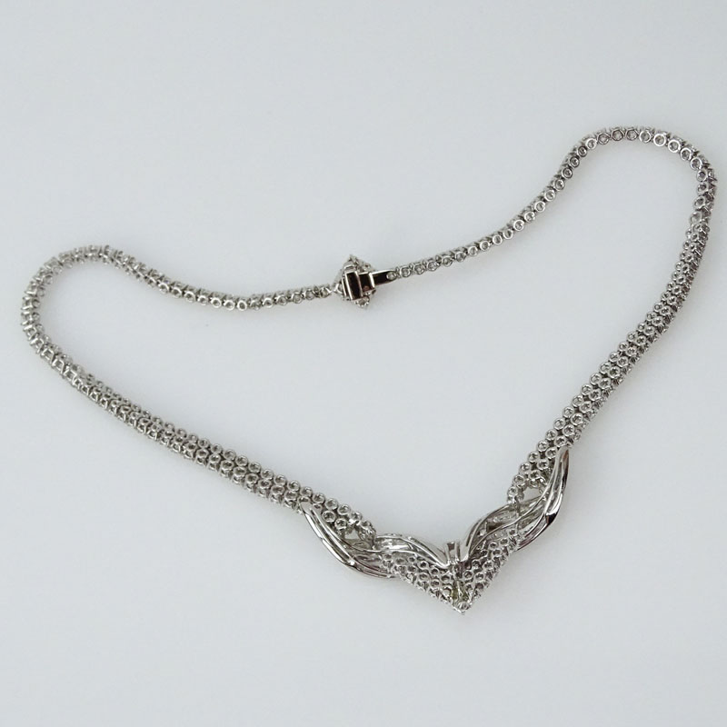 Approx. 27.0 Carat TW Diamond and 18 Karat White Gold Bib Necklace Set in the center with a 1.06 Carat Pear Shape Diamond