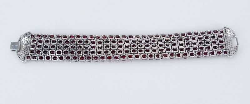 72.63 Carat Oval Cut Burma Ruby, 3.41 Carat Pave Set Round Brilliant Cut Diamond and 18 Karat White Gold Bracelet