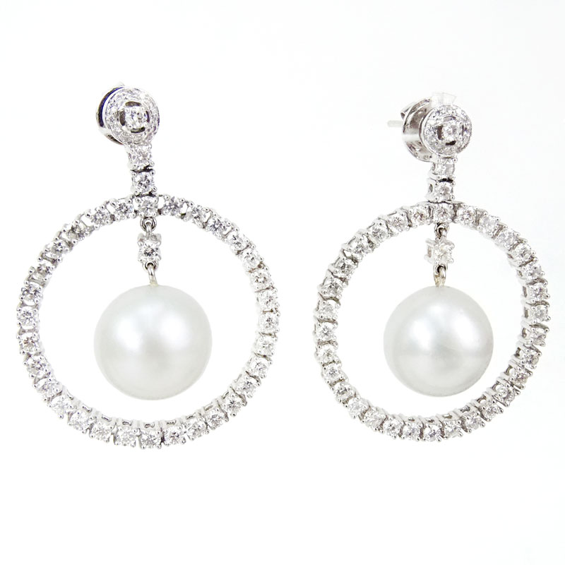 4.27 Carat Round Brilliant Cut Diamond, 13.6mm South Sea Pearl and 18 Karat White Gold Earrings.