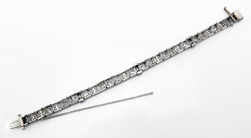 Art Deco Approx. 8.75 Carat Old European Cut Diamond, Caliber Cut Sapphire and Platinum Bracelet.