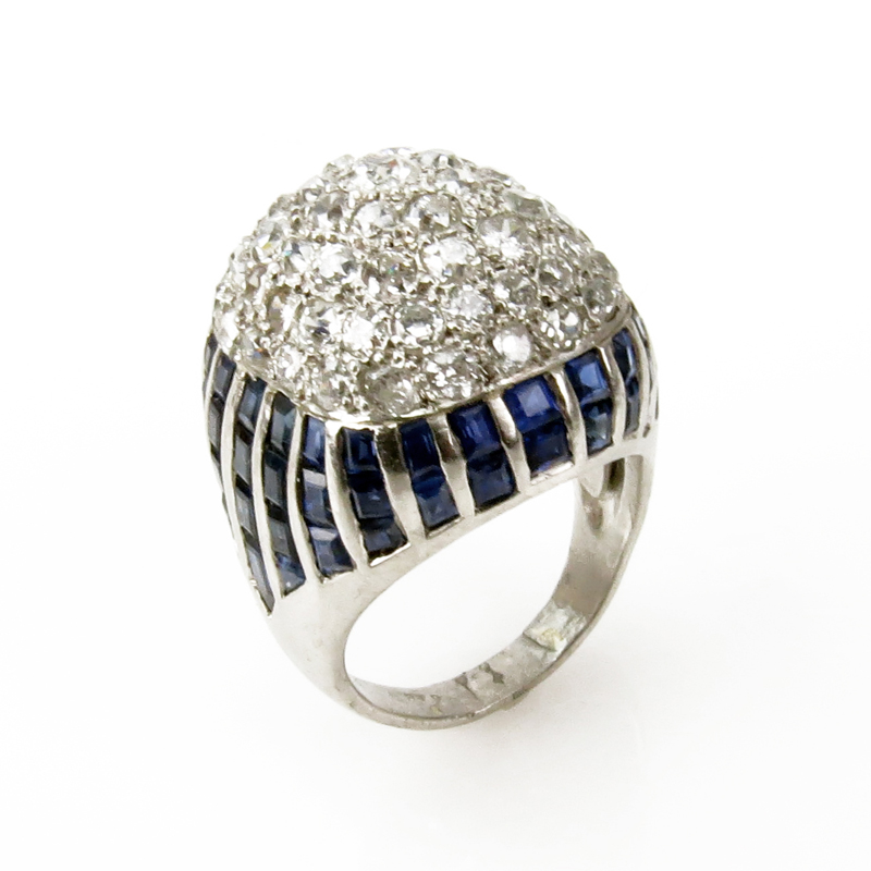 Circa 1920 Art Deco Approx. 4.0 Carat Old European Cut Diamond, 6.0 Carat Calibre Cut Sapphire and Platinum Dome Ring