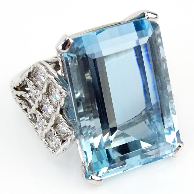 PGS Certified 35.63 Carat Rectangular Shape Aquamarine, .84 Carat Round Brilliant Cut Diamond and 18 Karat White Gold Ring.