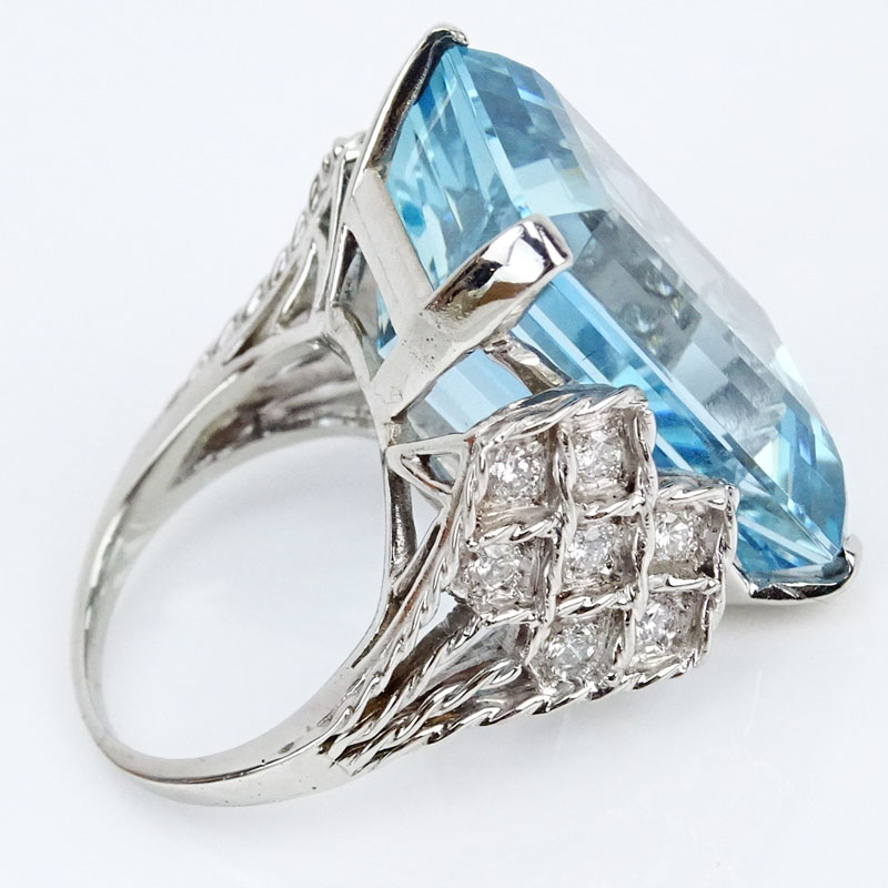 PGS Certified 35.63 Carat Rectangular Shape Aquamarine, .84 Carat Round Brilliant Cut Diamond and 18 Karat White Gold Ring.