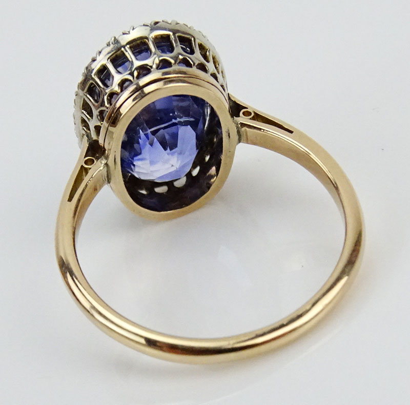 PGS Certified 7.50 Carat Oval Cut Natural Color Shift Intense Purplish Blue Sapphire and 14 Karat Rose and White Gold Ring