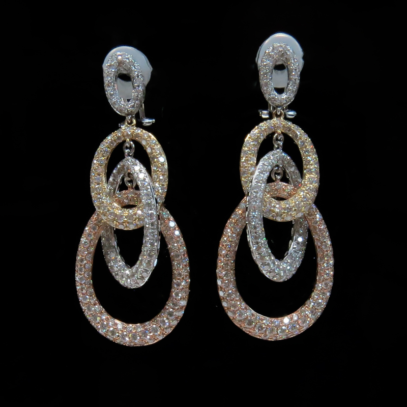 Cartier style Approx. 9.0 Carat Pave Set Round Brilliant Cut Diamond and Tricolor 18 Karat Gold Chandelier Earrings