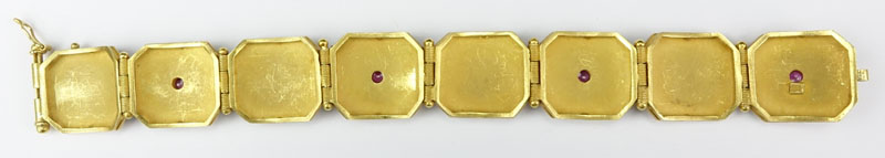 Rare Antique Byzantine style 18 Karat Yellow Gold Hinged Link Bracelet accented with Four Cabochon Rubies and Enamel