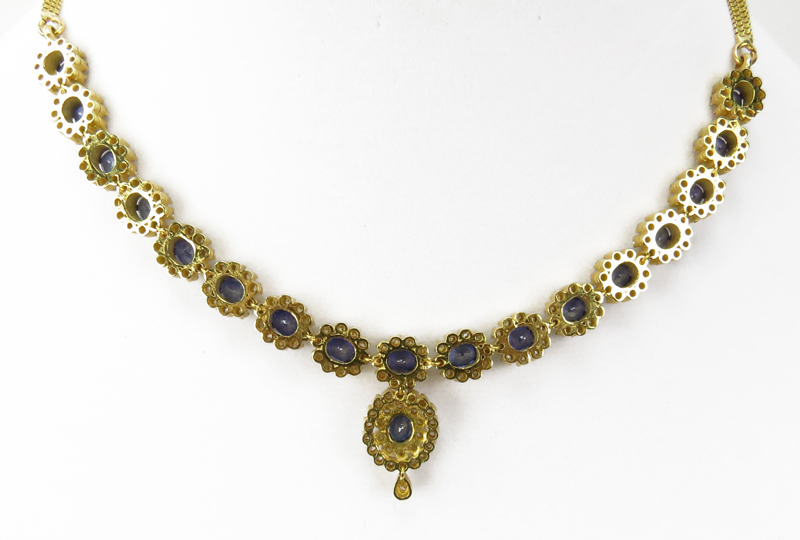 Approx. 17.50 Carat Sapphire, 7.0 Carat Round Brilliant Cut Diamond and 18 Karat Yellow Gold Necklace and Pendant Earring Suite.