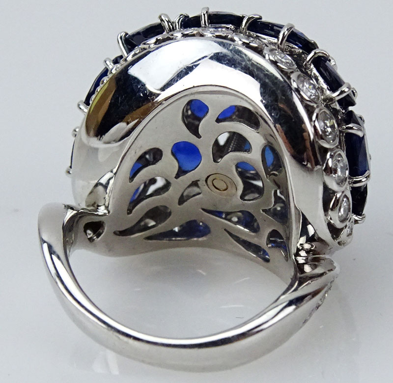 Approx. 13.65 Carat Oval and Round Cut Sapphire, 1.11 Carat Round Brilliant Cut Diamond and Platinum Ring