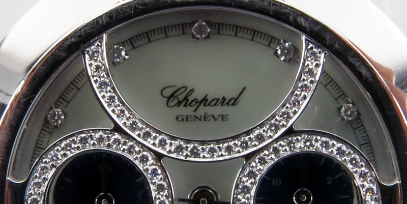 Man's Chopard 18 Karat White Gold Chronometer Bracelet swatch with Pave Set Diamond Overlay to Crystal, Mother of Pearl Dial and Sapphire Accents