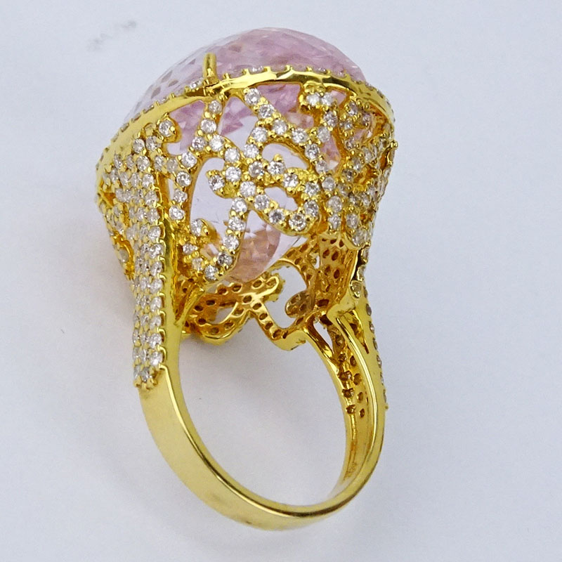 49.12 Carat Oval Cut Kunzite, 2.46 Carat Round Cut Diamond and 18 Karat Rose Gold Ring.