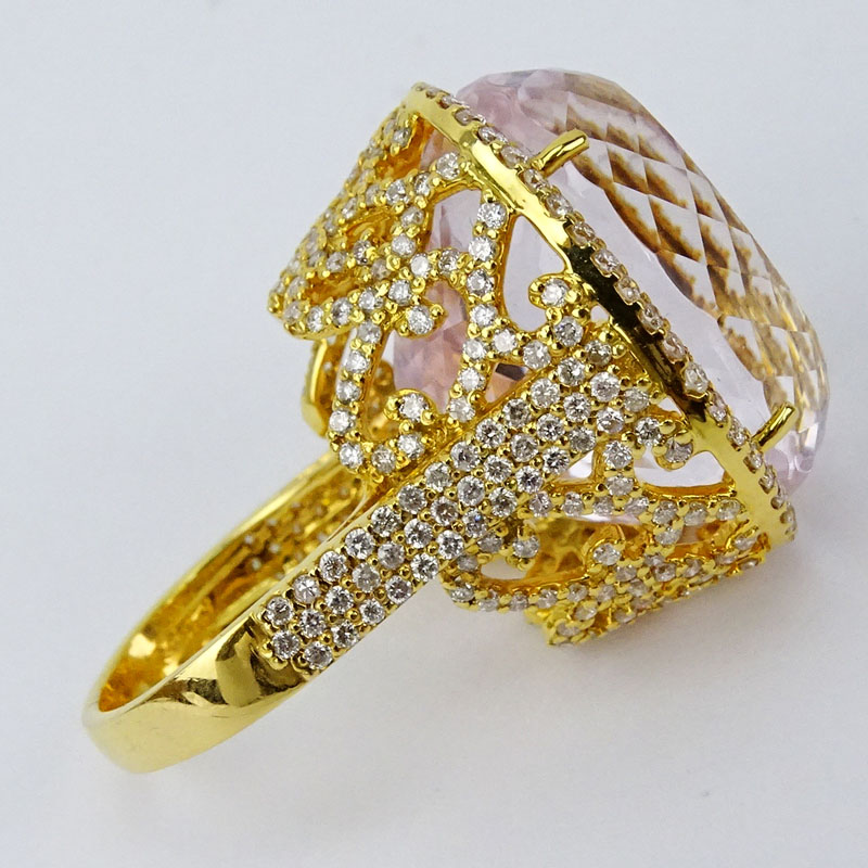 49.12 Carat Oval Cut Kunzite, 2.46 Carat Round Cut Diamond and 18 Karat Rose Gold Ring.