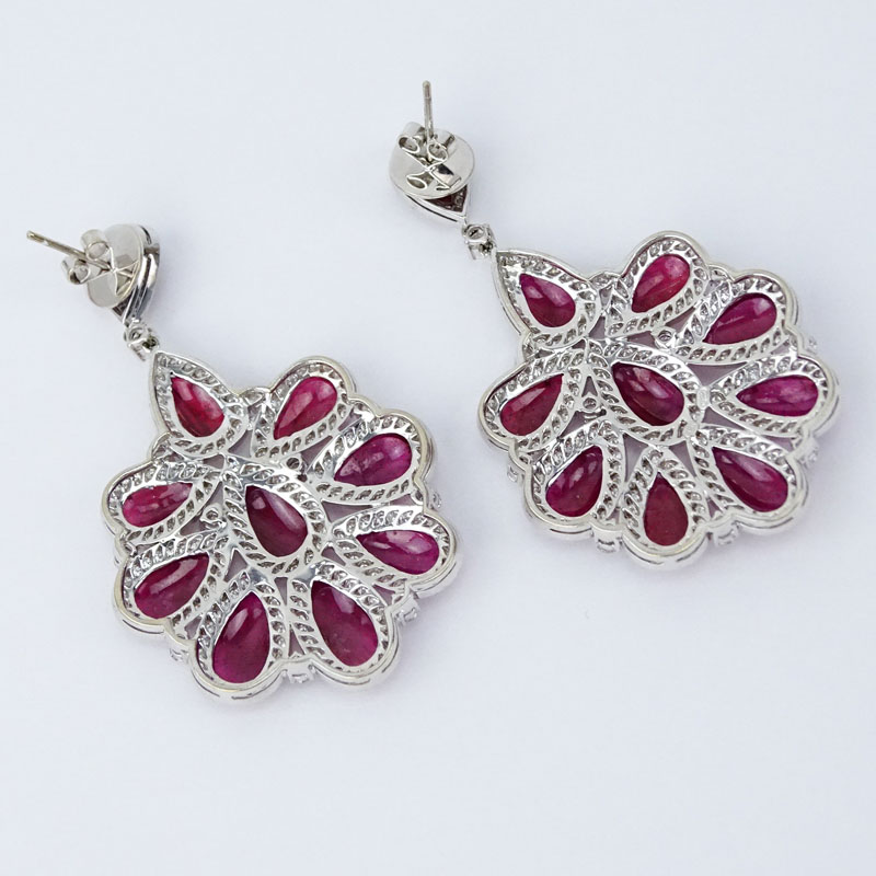 17.37 Carat Oval Cut Ruby, 5.58 Carat Round Brilliant Cut Diamond and 18 Karat White Gold Chandelier Earrings. 