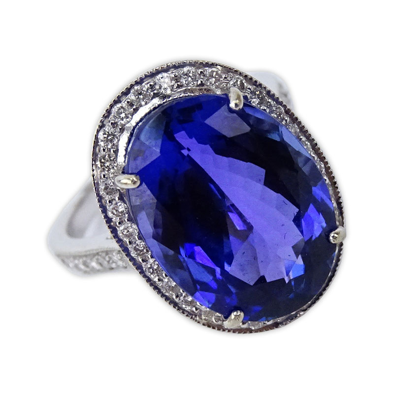 10.78 Carat Oval Cut Tanzanite, 1.10 Carat Diamond and 18 Karat White Gold Ring.