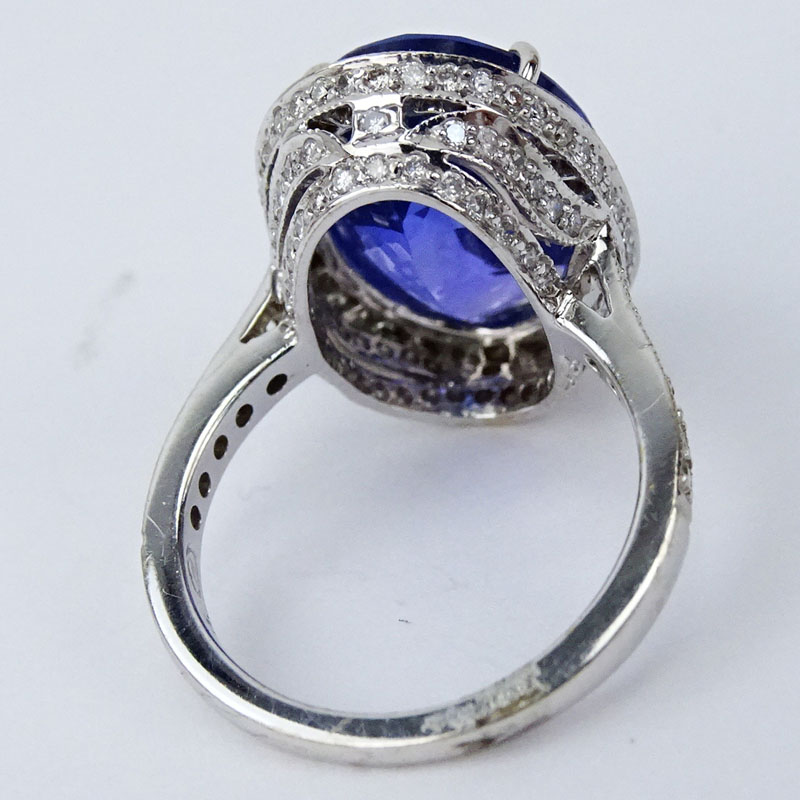 10.78 Carat Oval Cut Tanzanite, 1.10 Carat Diamond and 18 Karat White Gold Ring.