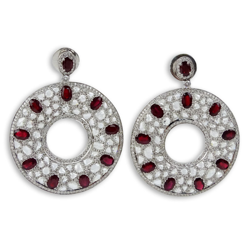  13.27 Carat Rose Cut Diamond, 11.13 Carat Oval Cut Ruby and 18 Karat White Gold Chandelier Earrings.