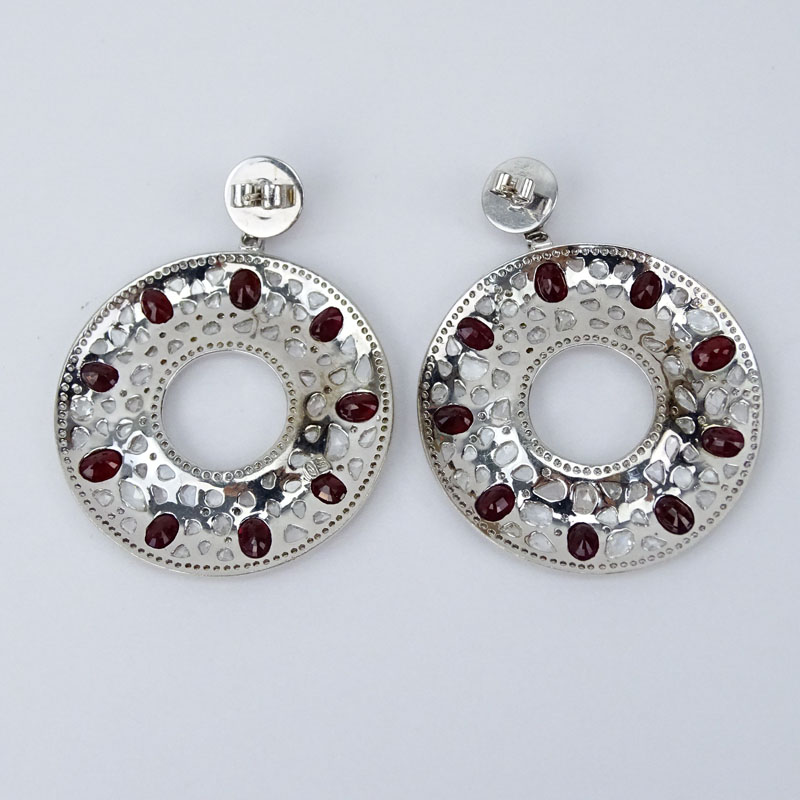  13.27 Carat Rose Cut Diamond, 11.13 Carat Oval Cut Ruby and 18 Karat White Gold Chandelier Earrings.