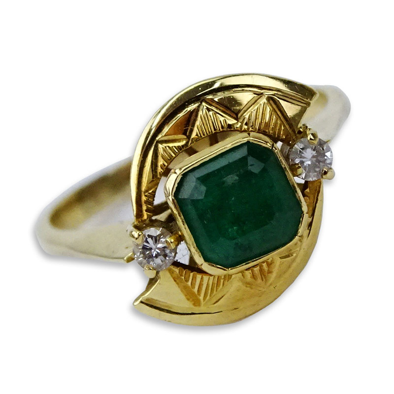 Vintage Colombian Emerald and 18 Karat Yellow Gold Ring Accented with two small Diamonds