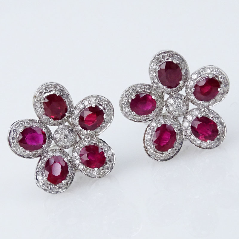 27.80 Carat Oval Cut Ruby, 12.18 Carat Round Brilliant Cut Diamond and 18 Karat White Gold Necklace and earring Suite. 