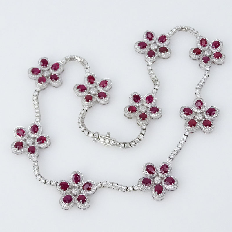 27.80 Carat Oval Cut Ruby, 12.18 Carat Round Brilliant Cut Diamond and 18 Karat White Gold Necklace and earring Suite. 