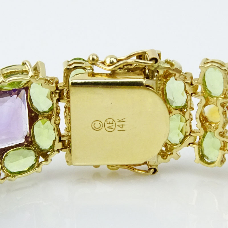 Retro Circa 1950s Amethyst, Peridot, Citrine and 14 Karat Yellow Gold Bracelet