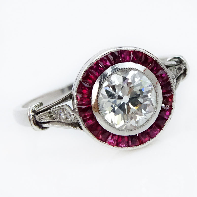  .80 Carat European Cut Diamond, Caliber Cut Ruby and Platinum Engagement Ring. 