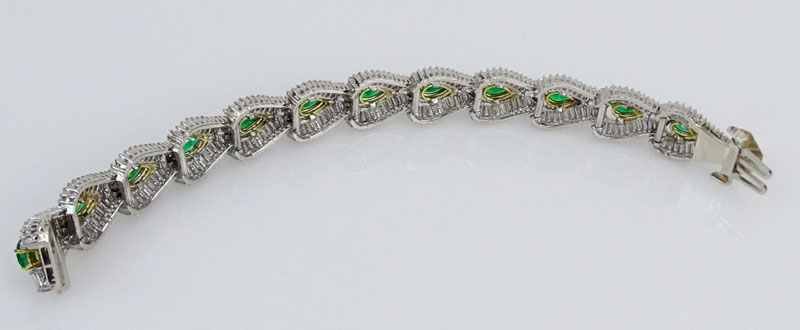 25.0 Carat Baguette Cut Diamond, 18.0 Carat Pear Shape Emerald and Platinum Bracelet.