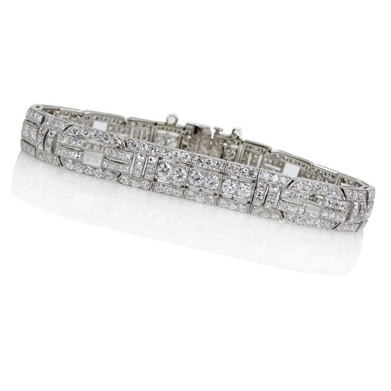 Circa 1920's Cartier Paris Art Deco Approx. 15.0 Carat Old European Cut and French Cut Diamond and Platinum Bracelet.