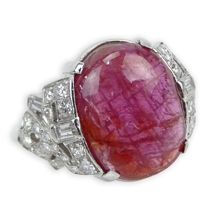 Lady's Art Deco Cabochon Ruby, 1.10 Carat Diamond and Platinum Ring. Ruby measures 15mm x 11.5mm. Diamonds 