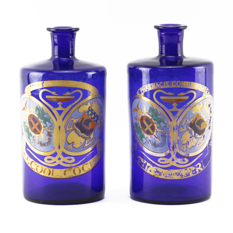 Pair of Cobalt Glass Gilt Painted "Pharmacie Continentale" Apothecary Bottles