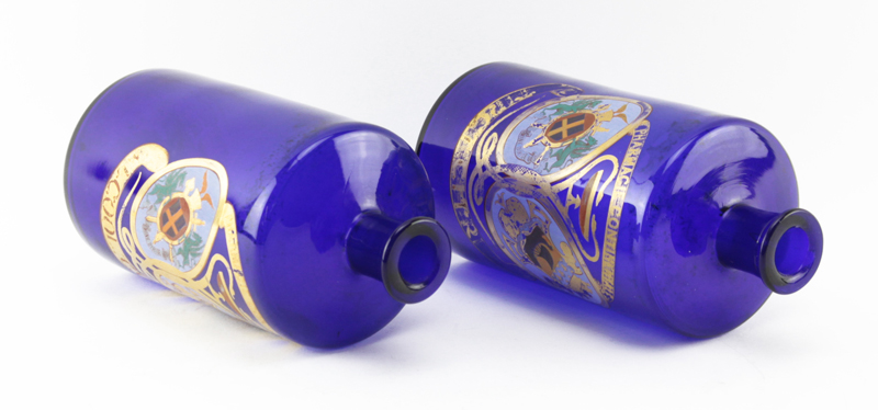 Pair of Cobalt Glass Gilt Painted "Pharmacie Continentale" Apothecary Bottles