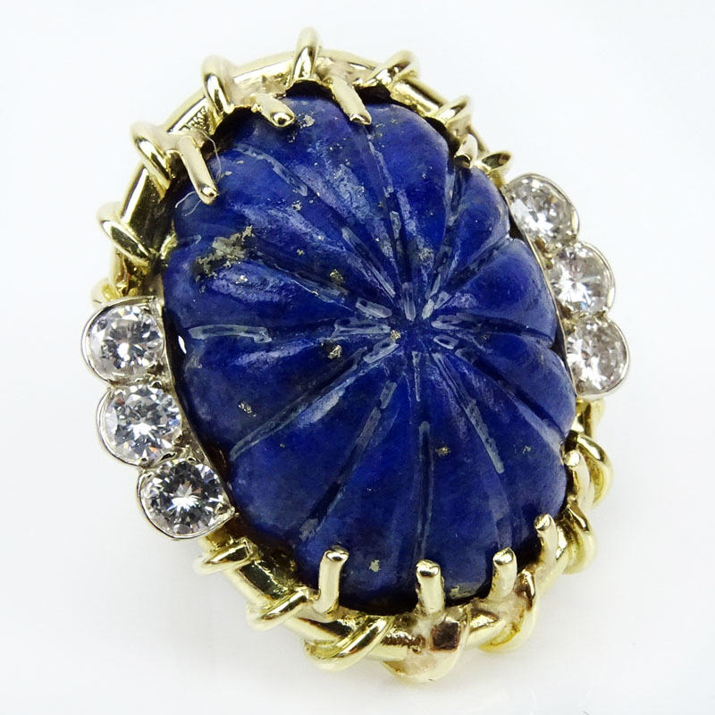 1.20 Carat Round Brilliant Cut Diamond, 14 Karat Yellow Gold and Carved Lapis Lazuli Ring. 