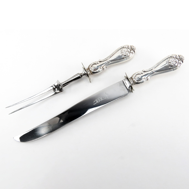 English Two (2) Part Carving Set with Sterling Silver Handles together with a French Two (2) Part Salad Servers with Sterling Handles and Horn in fitted box