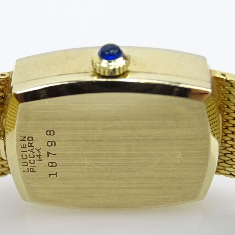 Lady's Vintage Lucien Picard 14 Karat Yellow Gold Bracelet Watch with Lapis Lazuli Dial and Diamond Bezel, Manual Movement