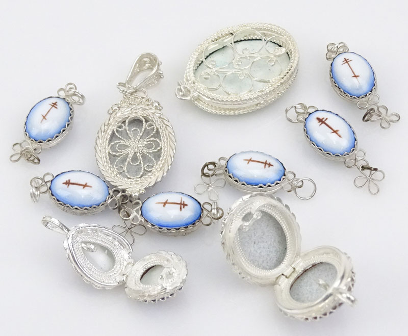 Collection of Ten (10) Russian Porcelain and White Metal Pendants