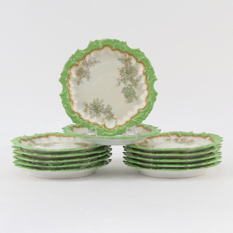 Twelve (12) 19/20th Century French T.V. Limoges Painted Porcelain Plates.