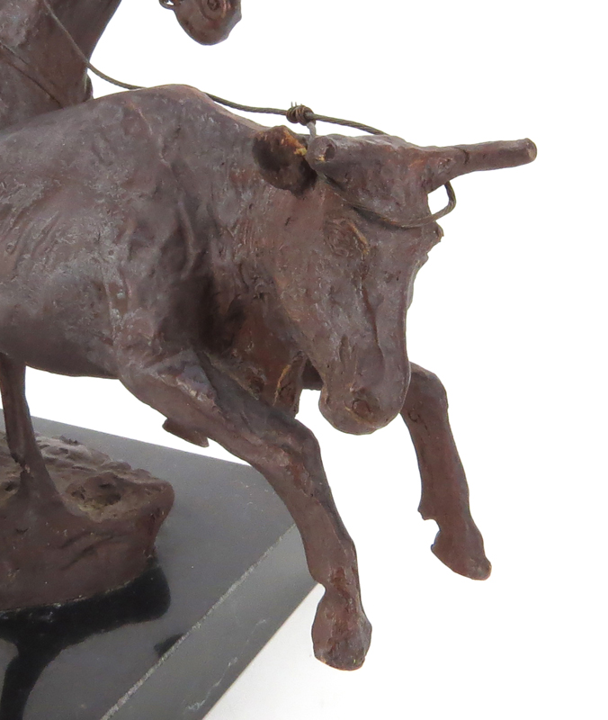 After: C.M. Russell, American (1864-1926) "Cowboy Roping Bull" Bronze Sculpture on Black Marble Base. 