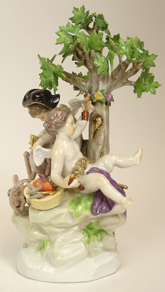 19/20th Century Meissen Porcelain Group "Cherubs Sharpening Their Arrows" Signed with Crossed Swords Mark