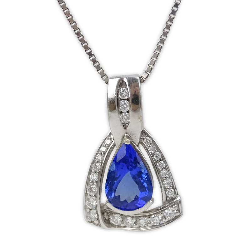  4.20 Carat Pear Shape Tanzanite, .98 Carat Round Brilliant Cut Diamond and 18 Karat White Gold Pendant with 14 Karat White Gold Chain. 