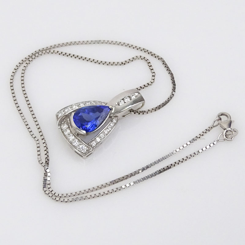  4.20 Carat Pear Shape Tanzanite, .98 Carat Round Brilliant Cut Diamond and 18 Karat White Gold Pendant with 14 Karat White Gold Chain. 