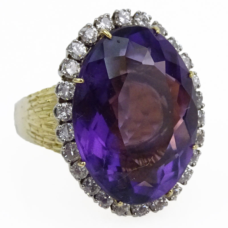 Vintage Oval Cut Amethyst and 14 Karat Yellow Gold Ring with Diamond Accents
