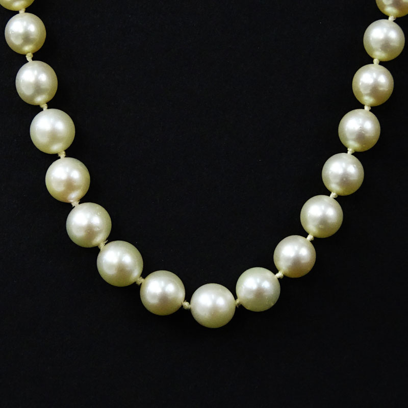 Vintage Single Strand Pearl Necklace with Sapphire, Ruby and 14 Karat Yellow Gold Clasp