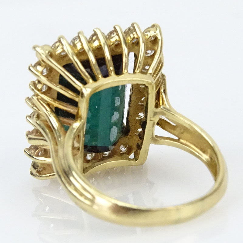 15.0 Carat Emerald Cut Tourmaline, 2.25 Carat Round Brilliant Cut Diamond and 18 Karat Yellow Gold Ring.