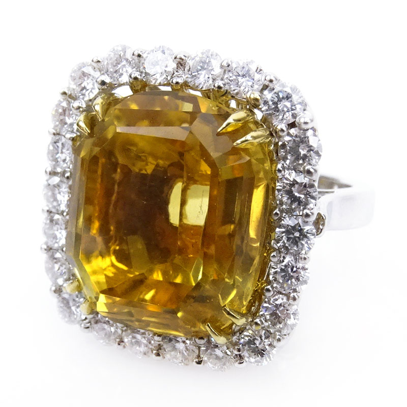 23.0 Carat Cushion Cut Citrine, 2.20 Carat Round Brilliant Cut Diamond and 18 Karat White Gold Ring. 