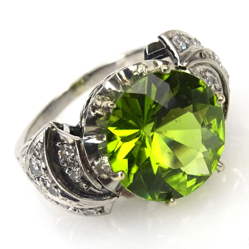 5.0 Carat Round Brilliant Cut Peridot, .60 Carat Diamond and Palladium Ring. 