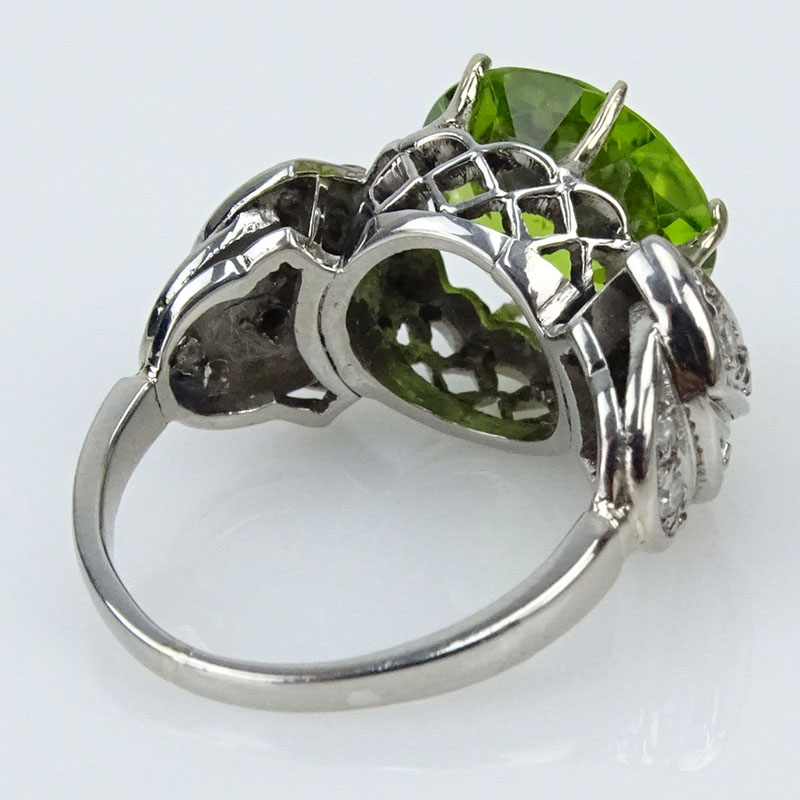 5.0 Carat Round Brilliant Cut Peridot, .60 Carat Diamond and Palladium Ring. 